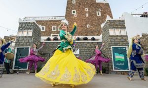 Explore the enchanting world of mountain performance arts at the Qemam International Festival in Saudi Arabia's Asir region.